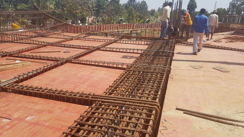 Beam and slab reinforcement laid across the formwork before a concrete pour