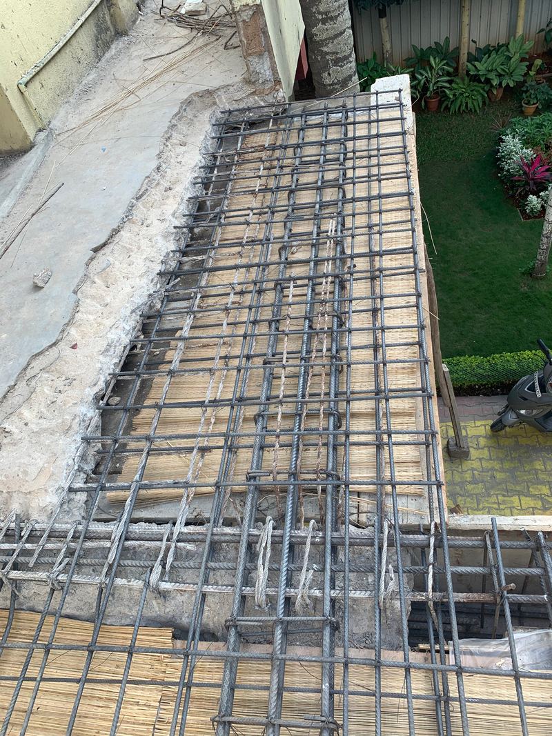 Reinforcement along the slab edge beside a garden